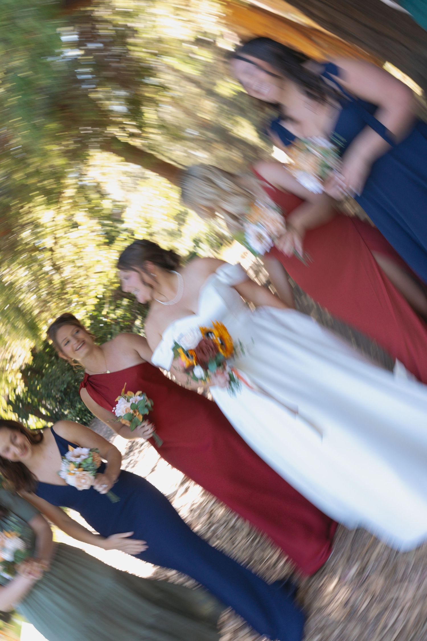 A blurred motion wedding celebration scene with bridesmaids.