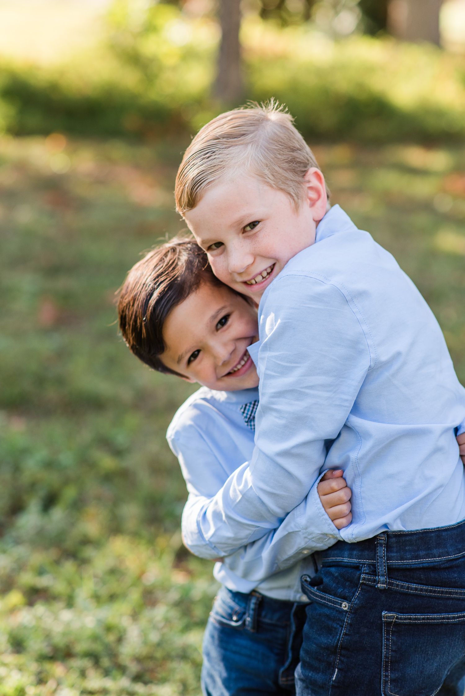 rural plains park boys hugging portrait