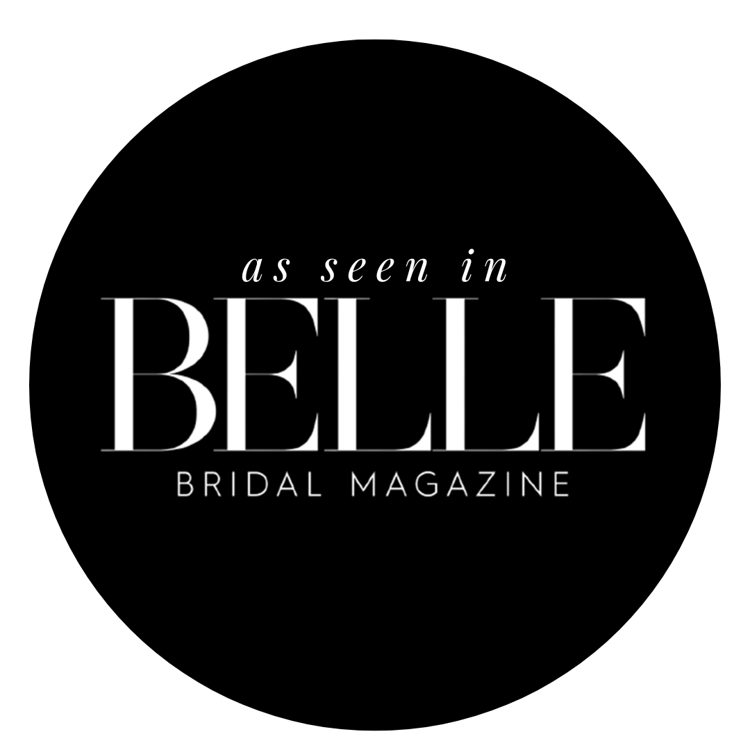 A black and white circular logo for Belle Bridal Magazine featuring elegant typography.