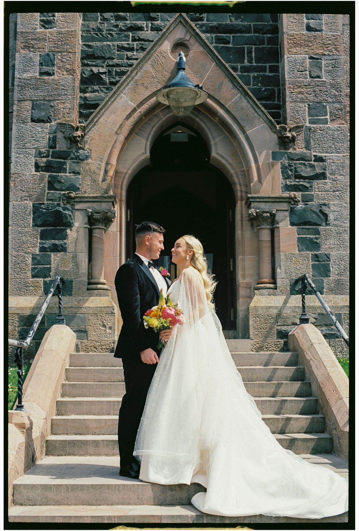 A wedding couple poses on stone church steps in a sequence of romantic photos showing their special day.
