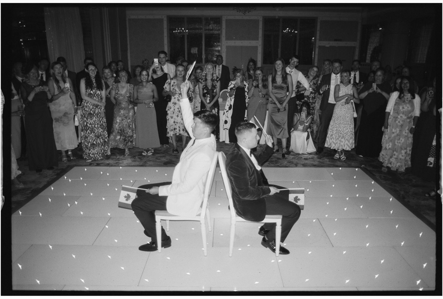 Black and white photos showing a formal dance event with couples moving across a ballroom floor.