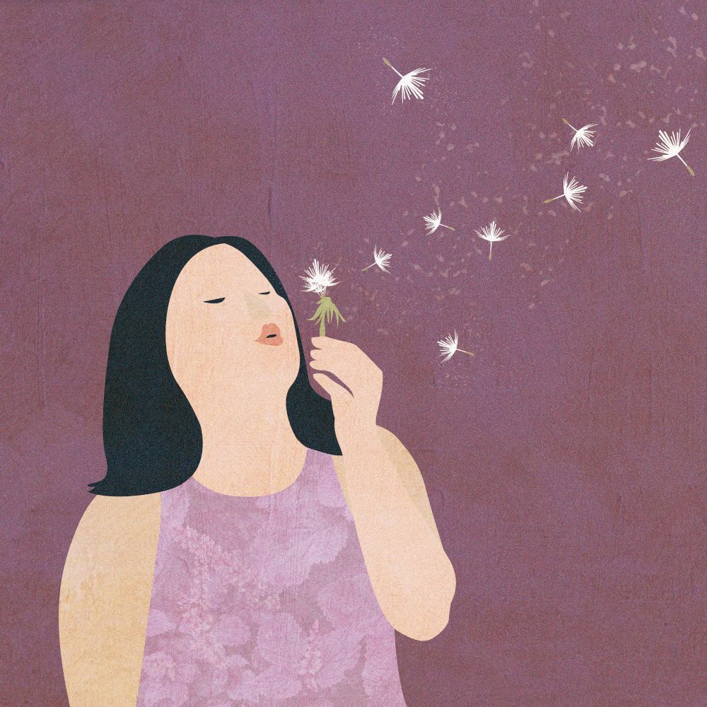 Soft illustration of a woman blowing dandelion seeds against a purple background.