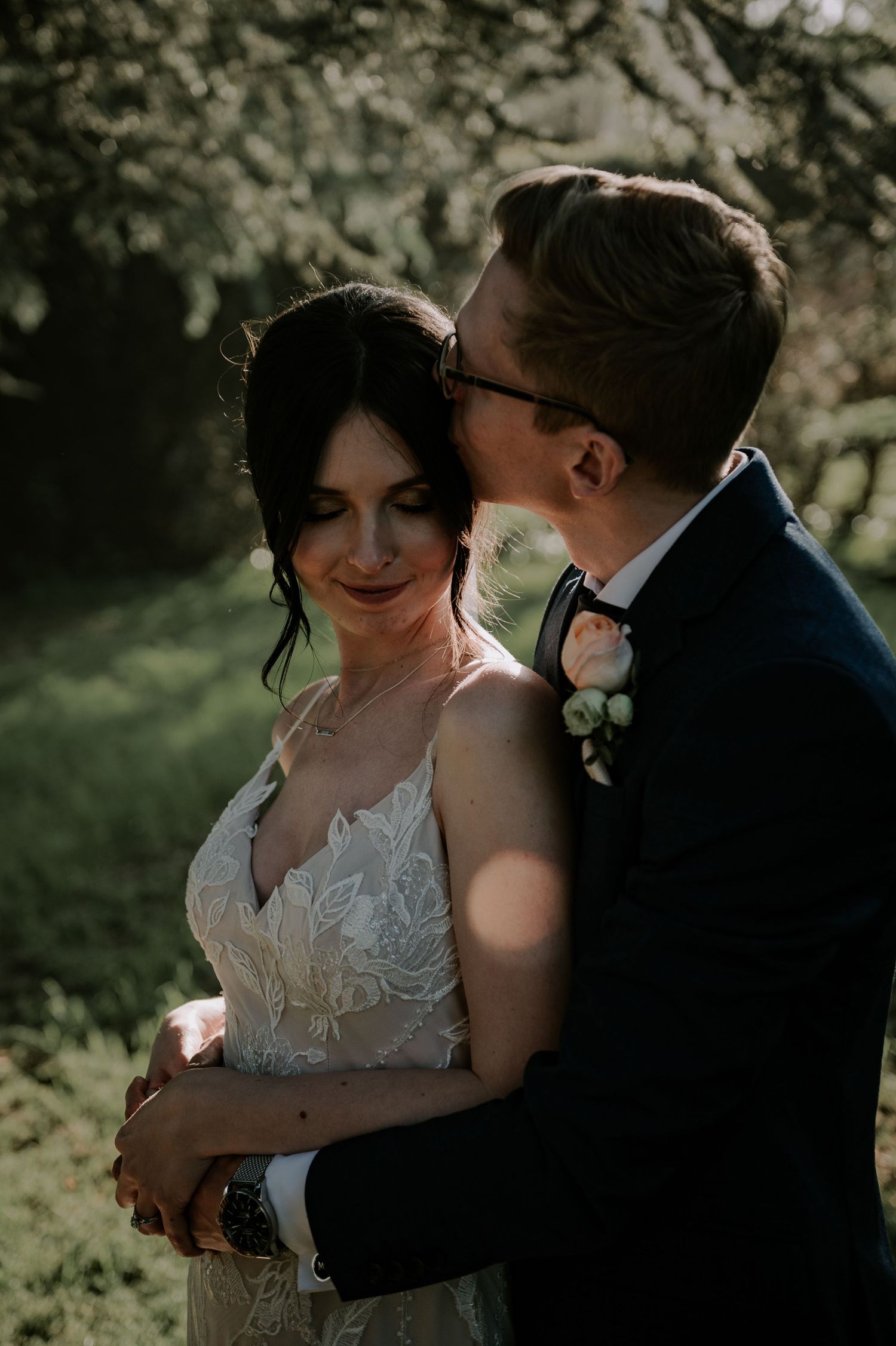 A romantic wedding photography sequence shows a couple embracing in dappled sunlight among greenery.