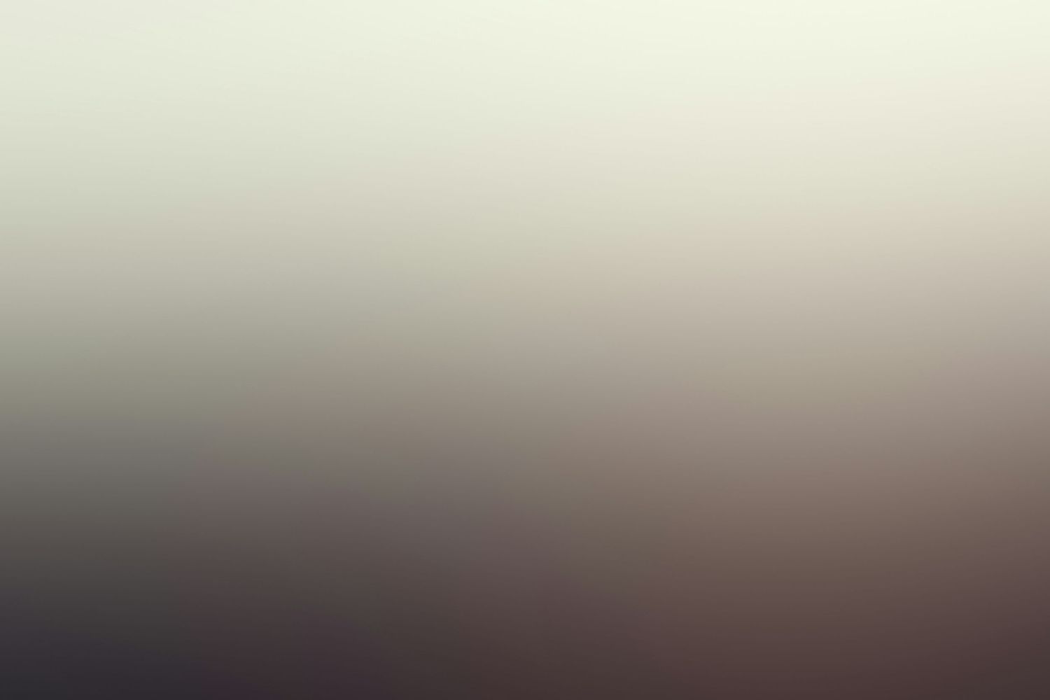 A soft gradient background blending light beige and muted mauve tones, ideal for minimalist design projects.