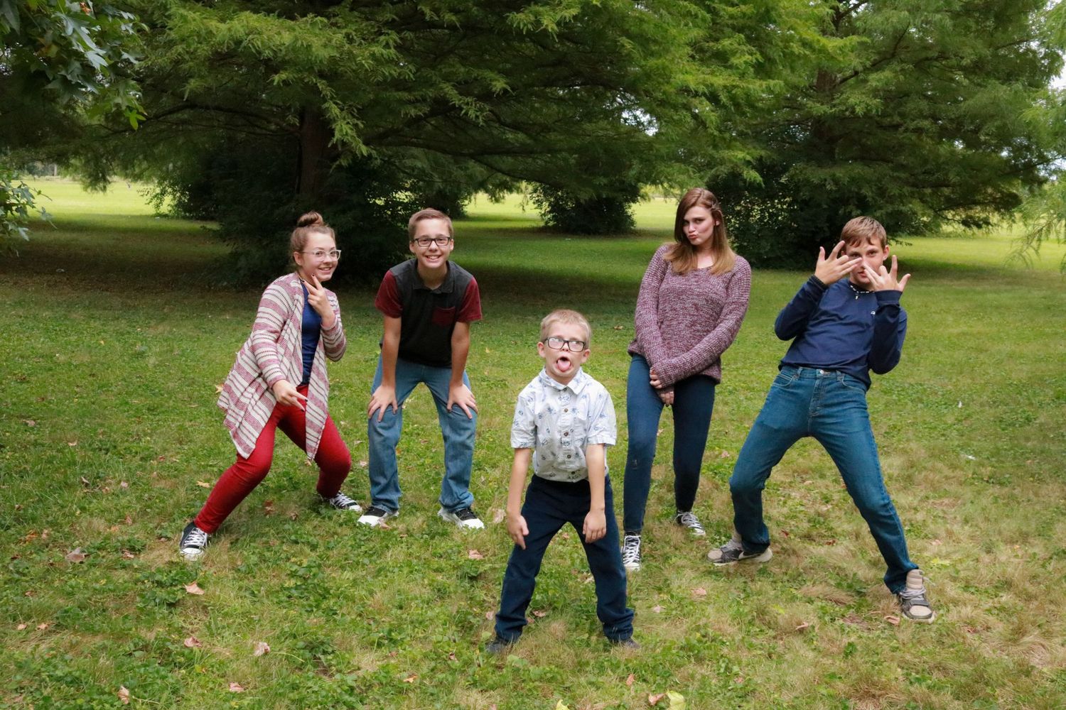 Fall family photoshoot at Ellenberger Park in Indianapolis, IN with kiddos acting silly and making funny faces