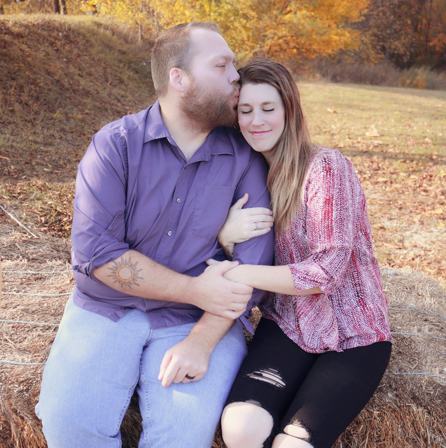 Husband and wife at Anderson Orchard in Mooresville, IN for a fall photoshoot