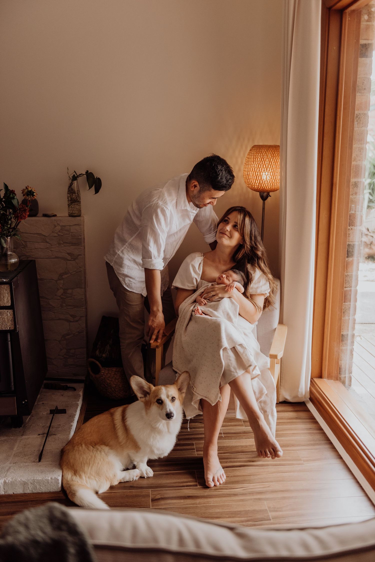 Macarthur Sydney newborn photography of family with baby and dog in light-filled in-home photoshoot