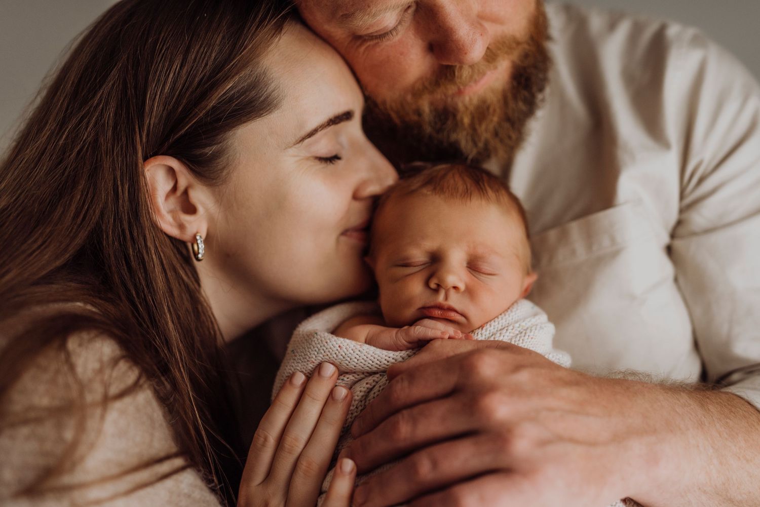 parents cuddling sleeping newborn baby in-home newborn photography western Sydney natural lifestyle session