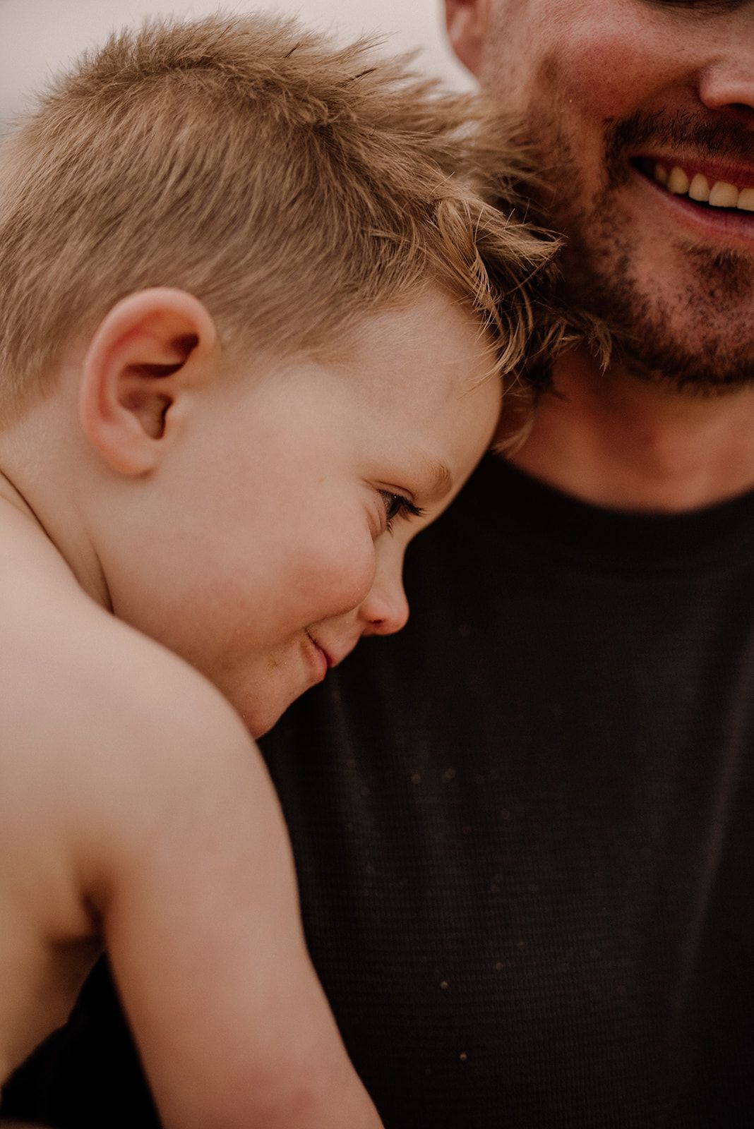 Watsons Bay family photography close-up of father and son sharing a quiet moment