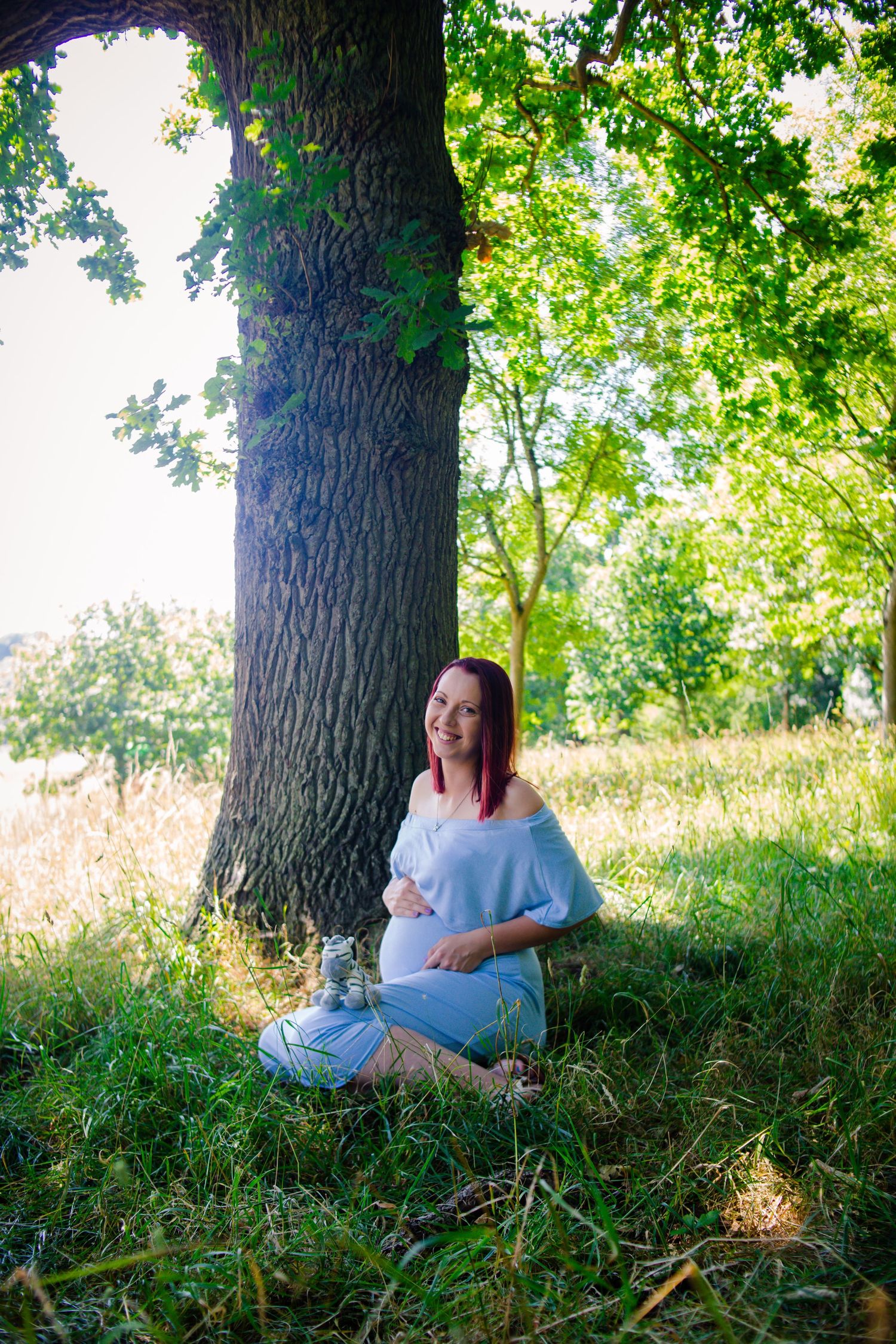 Natural maternity photography session in South Wales capturing glowing mother-to-be by Winter Willow Photography.