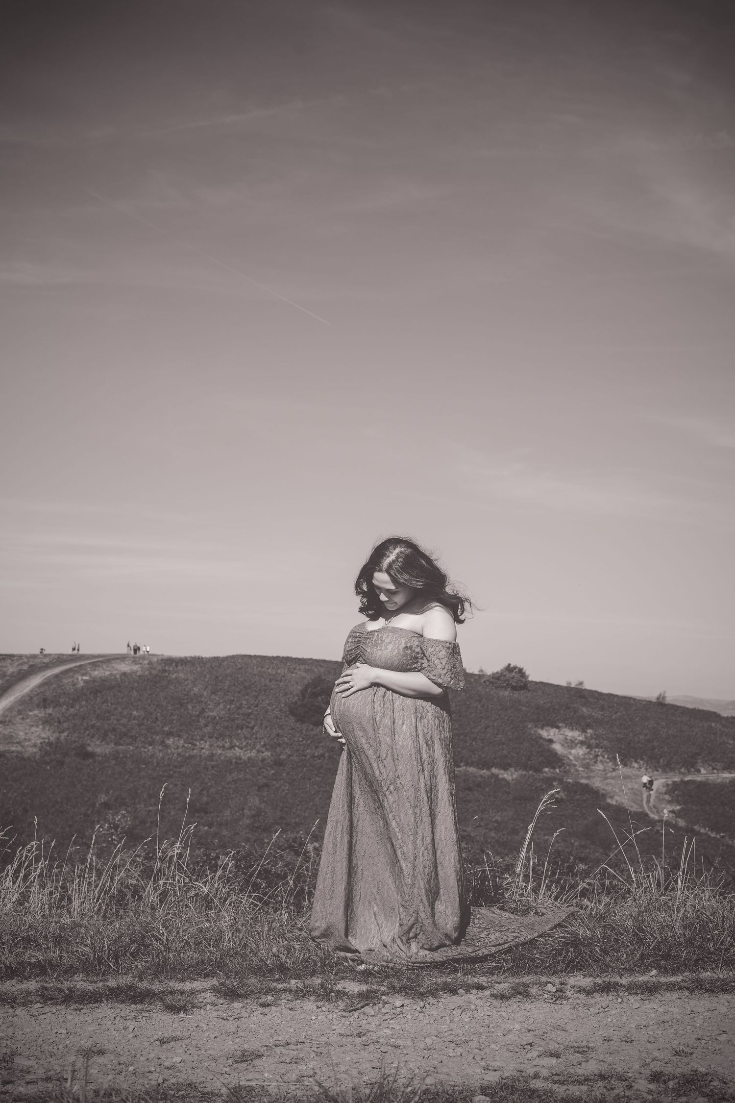 Natural maternity photography session in South Wales capturing glowing mother-to-be by Winter Willow Photography.