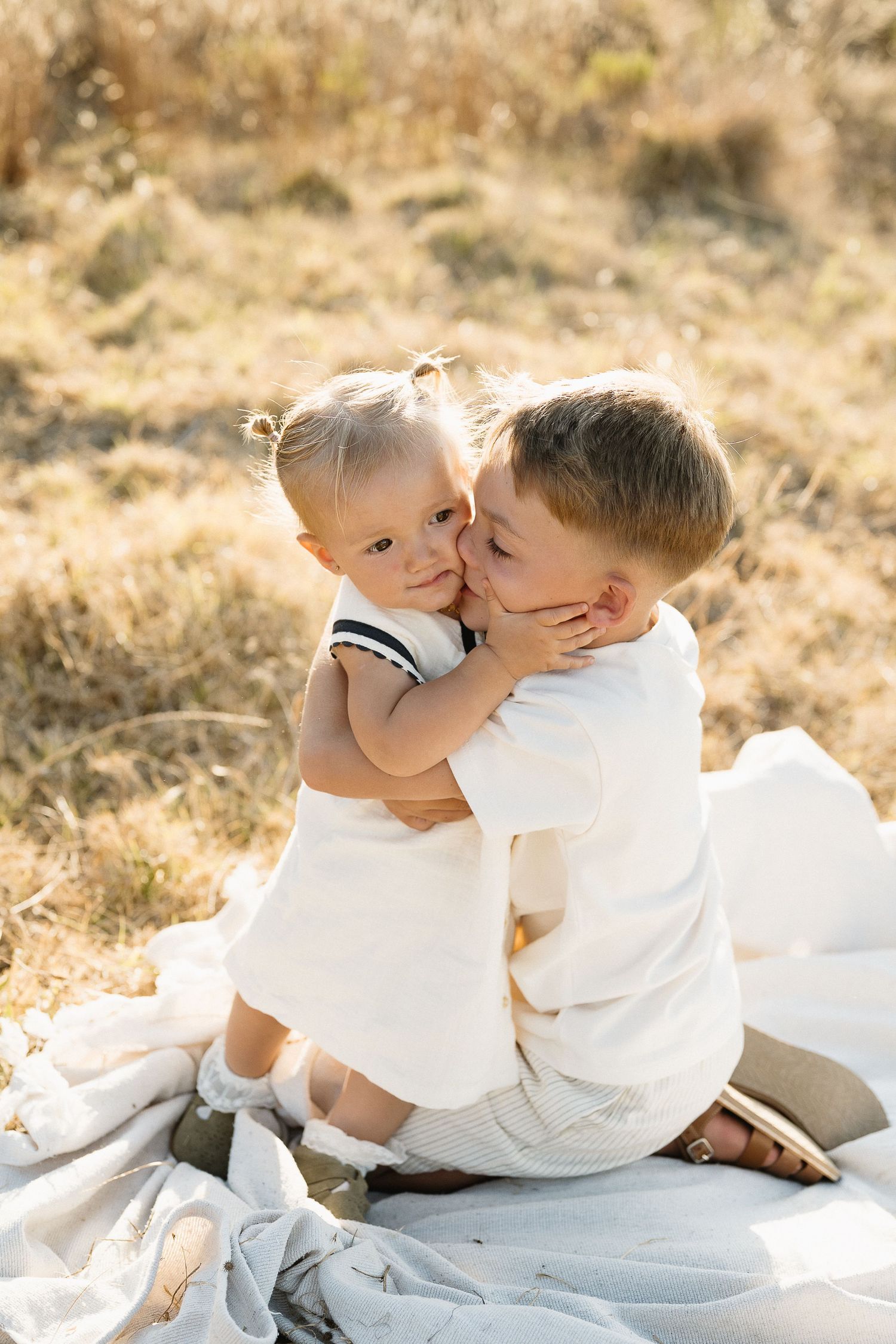 Brother and sister showing their love for each other at Lion's Head, Cape Town.