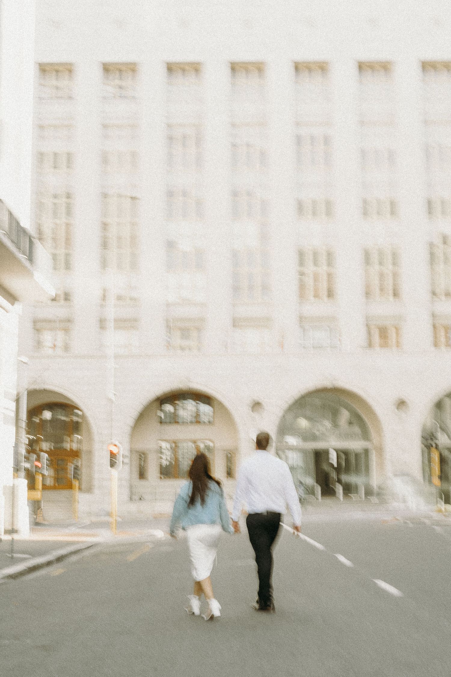 Couple walking in the street in Cape Town.