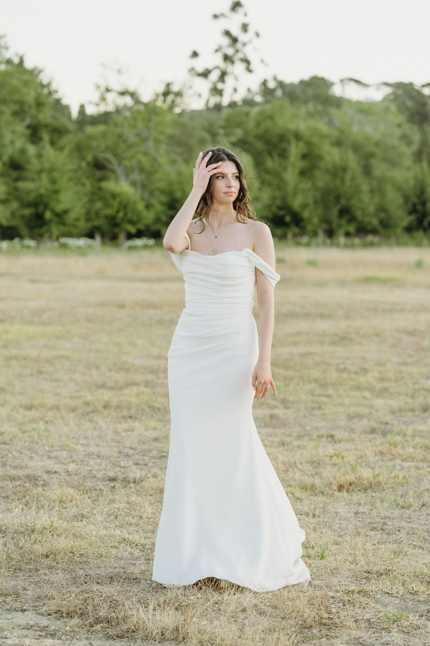 Bride striking a pose in nature.