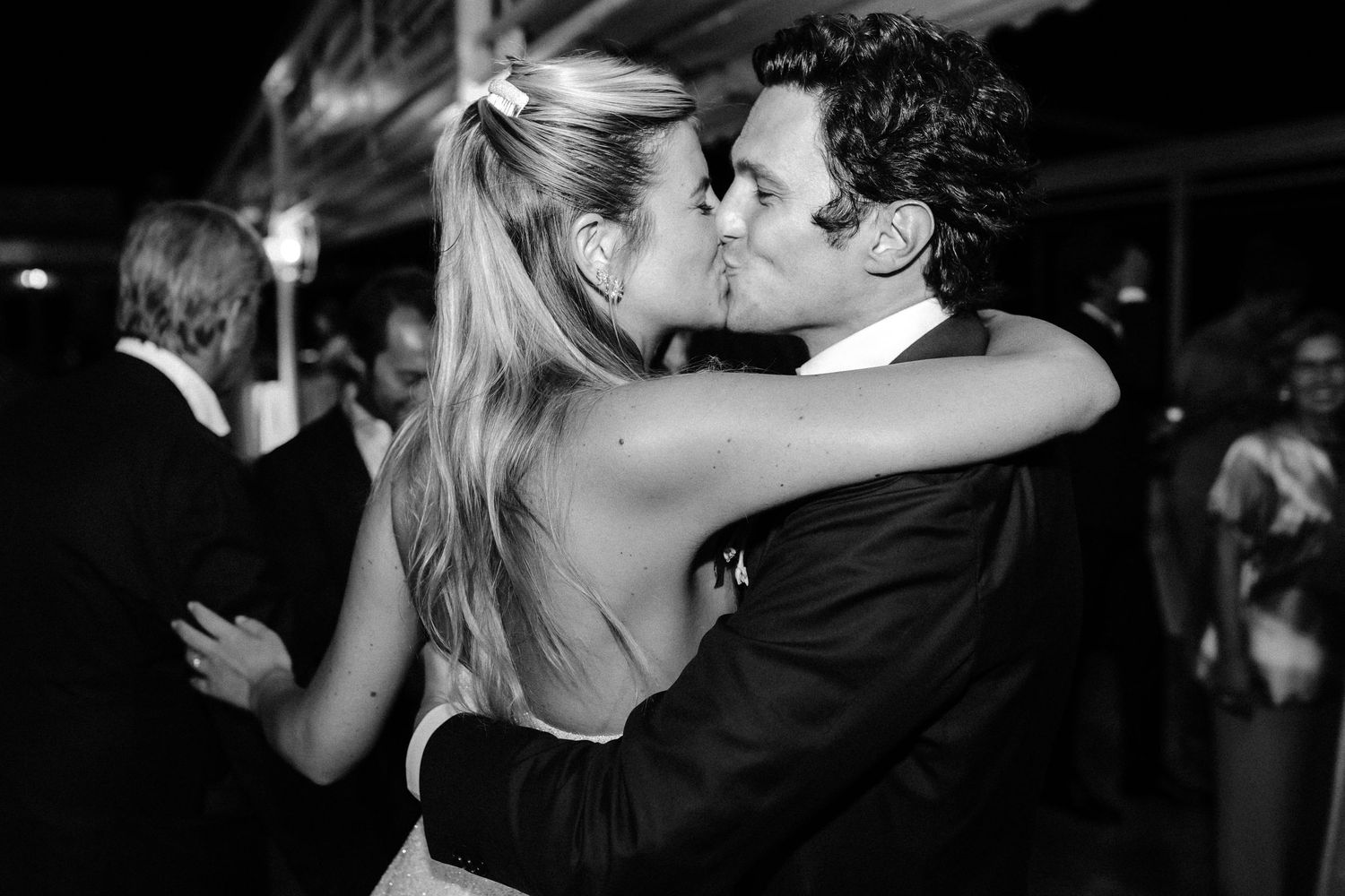 A romantic wedding photo collage capturing intimate dance moments and kisses in black and white.