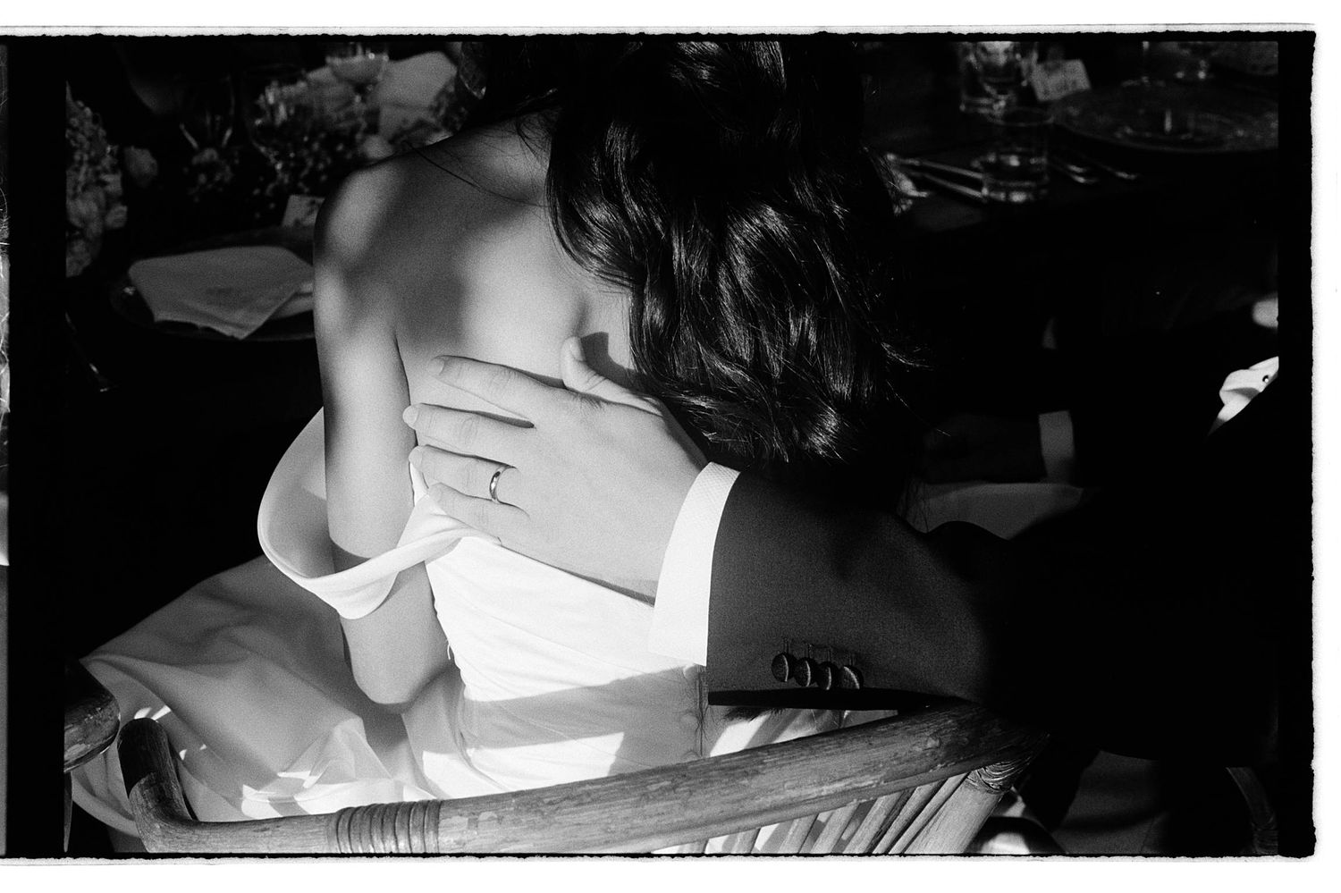 A series of black and white intimate boudoir photographs showing close-up details of a person in lingerie.