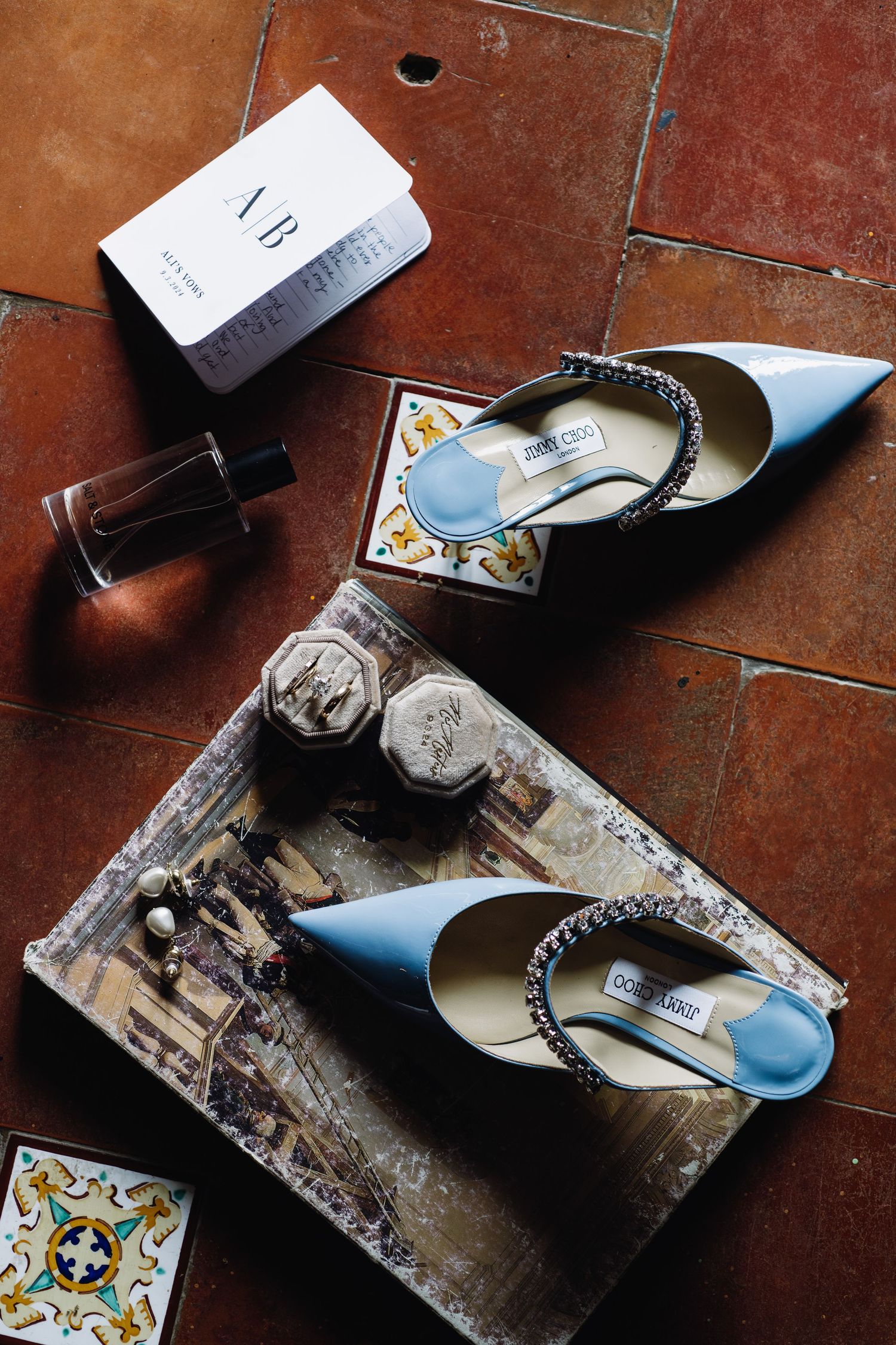 A sequence of images showing a broken CD case and scattered pieces on a reddish-brown floor surface.