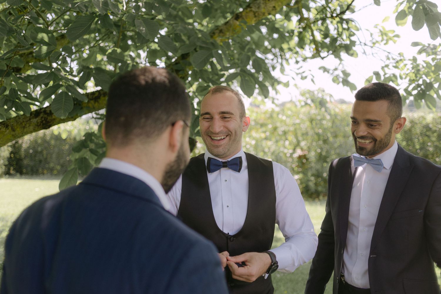 A series of candid moments captured at an outdoor wedding celebration with guests in formal attire.