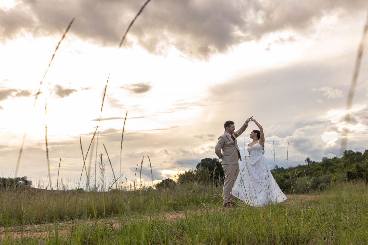 Bride and groom practicing their first dance at kuthaba bush lodge