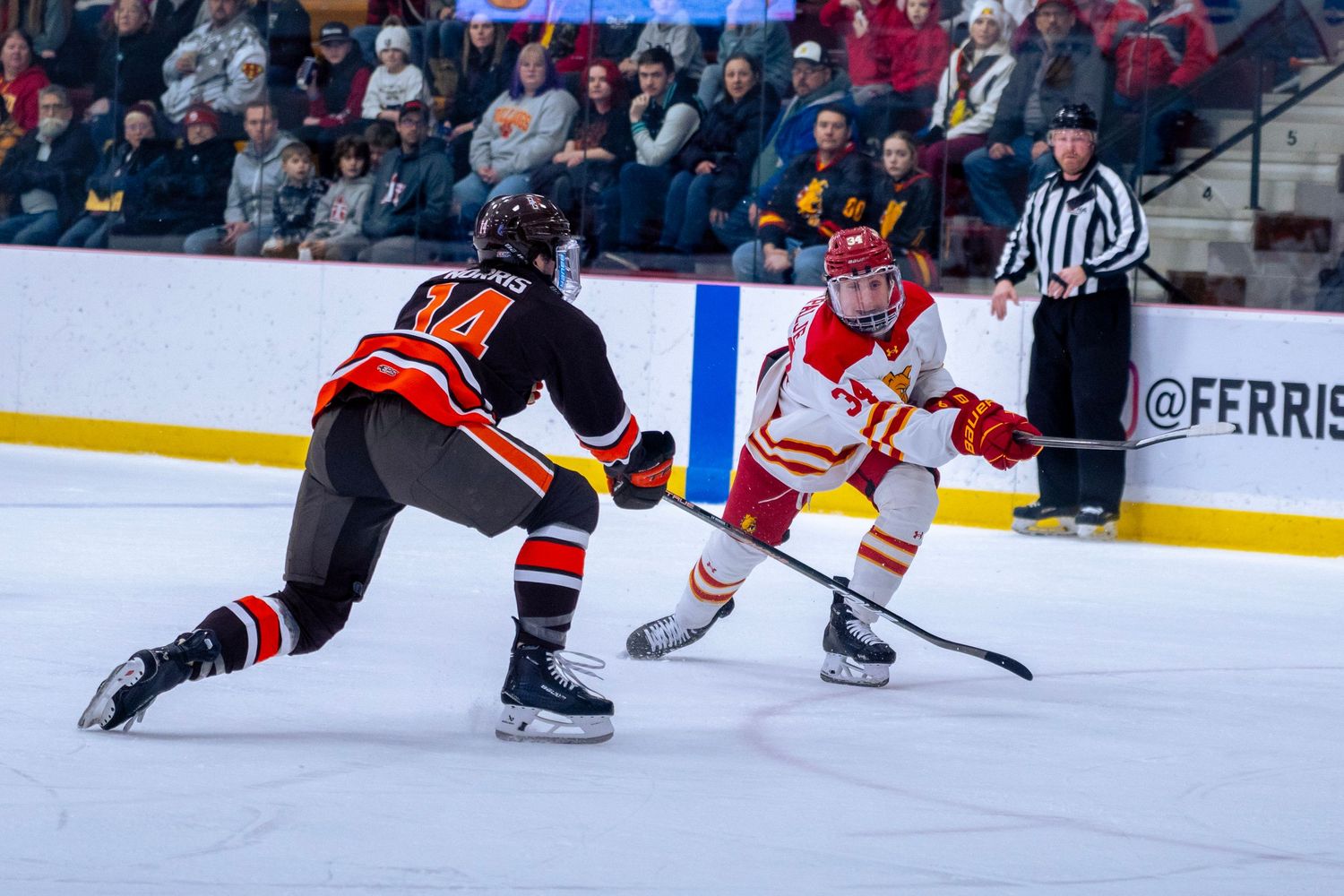 A sequence of ice hockey players in red and white jerseys making sliding saves and defensive plays during a game.
