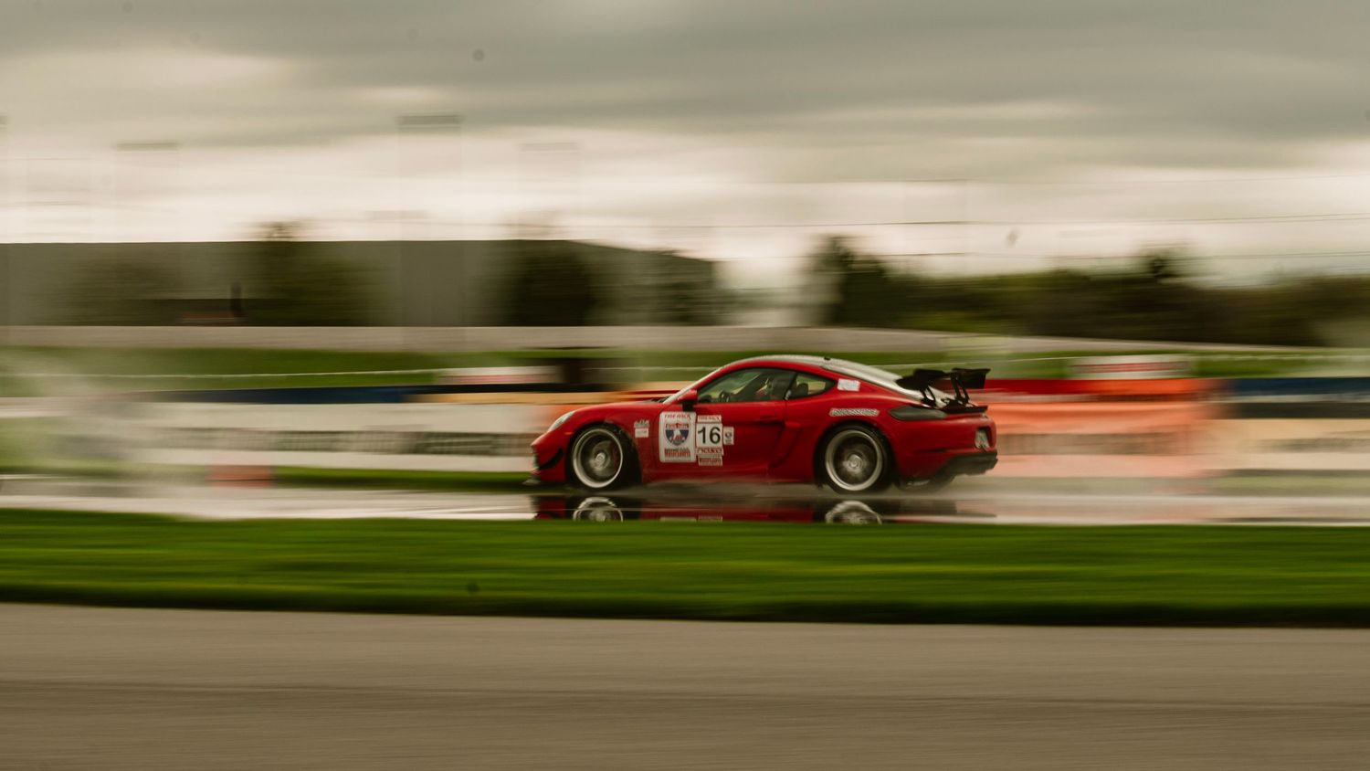 Performance cars racing at sunset with dynamic motion effects.