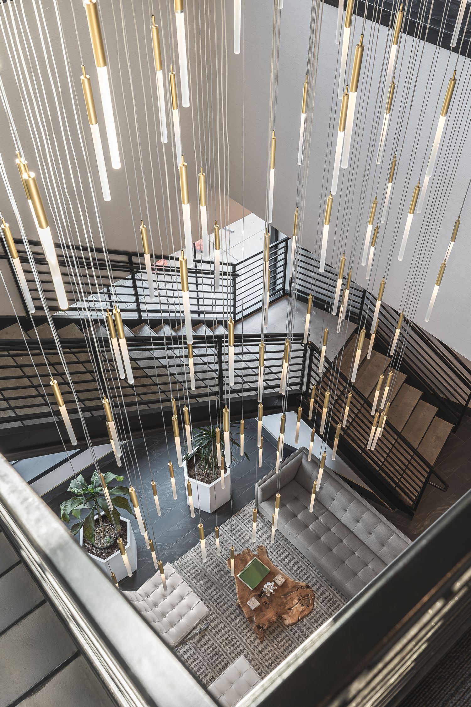 Lobby in the 800 Lofts in Lawrence Kansas. Photo produced by Derek Mecca Photography - AirBnB, Short-Term Rental and luxury real estate.