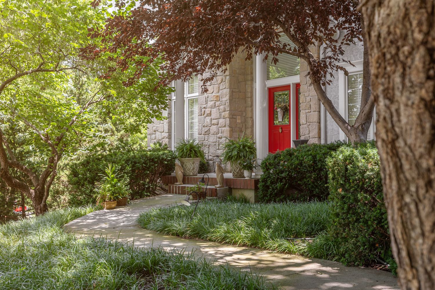 Luxury home entry in Cedar Creek Kansas. Premium photography by Derek Mecca Photography. High-end real estate, architecture & interiors.