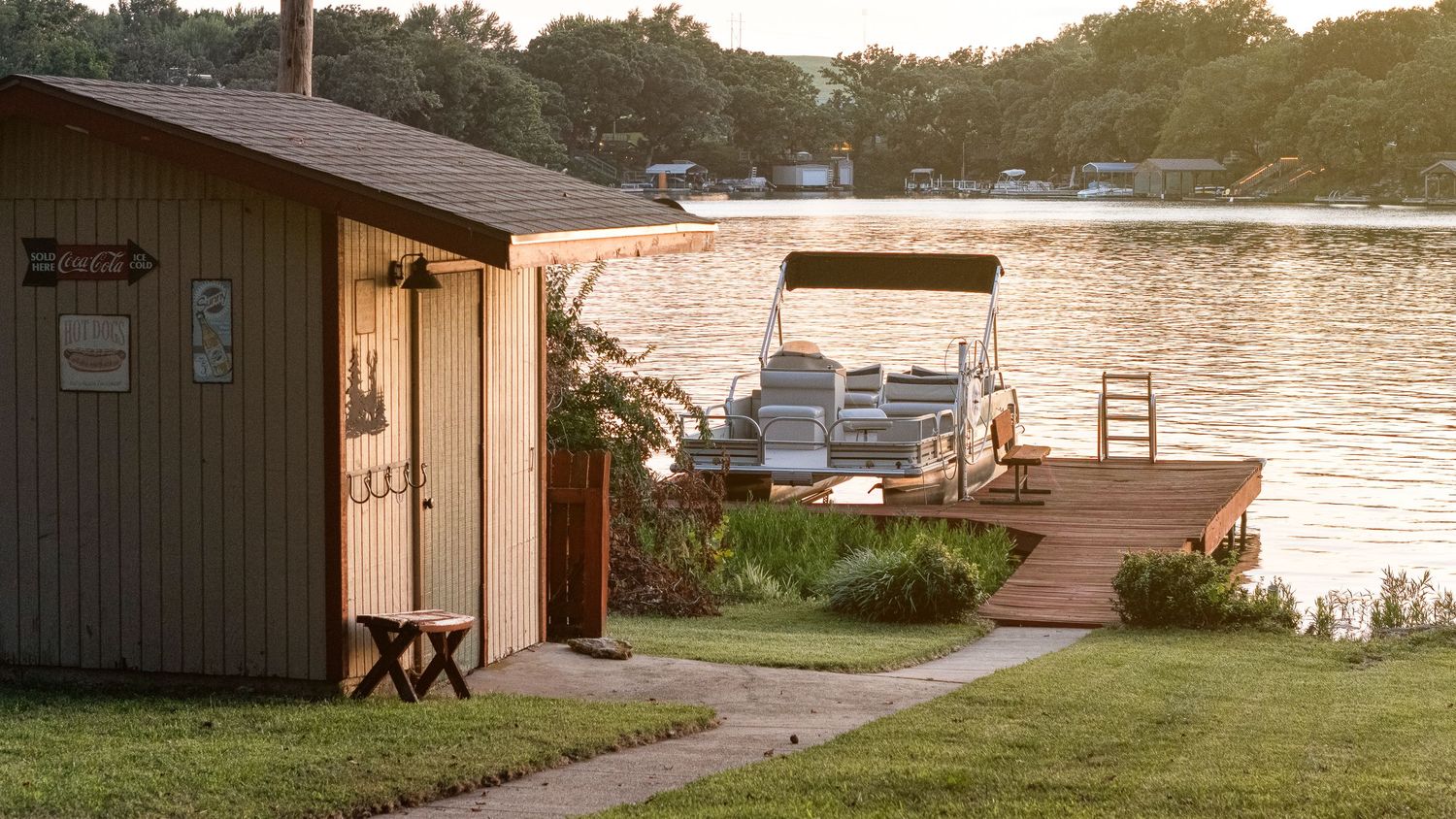 Lifestyle photo of a lake doc for an AirBnB in Wamego KS. Produced by Derek Mecca - photography for architecture & interiors in Kansas.