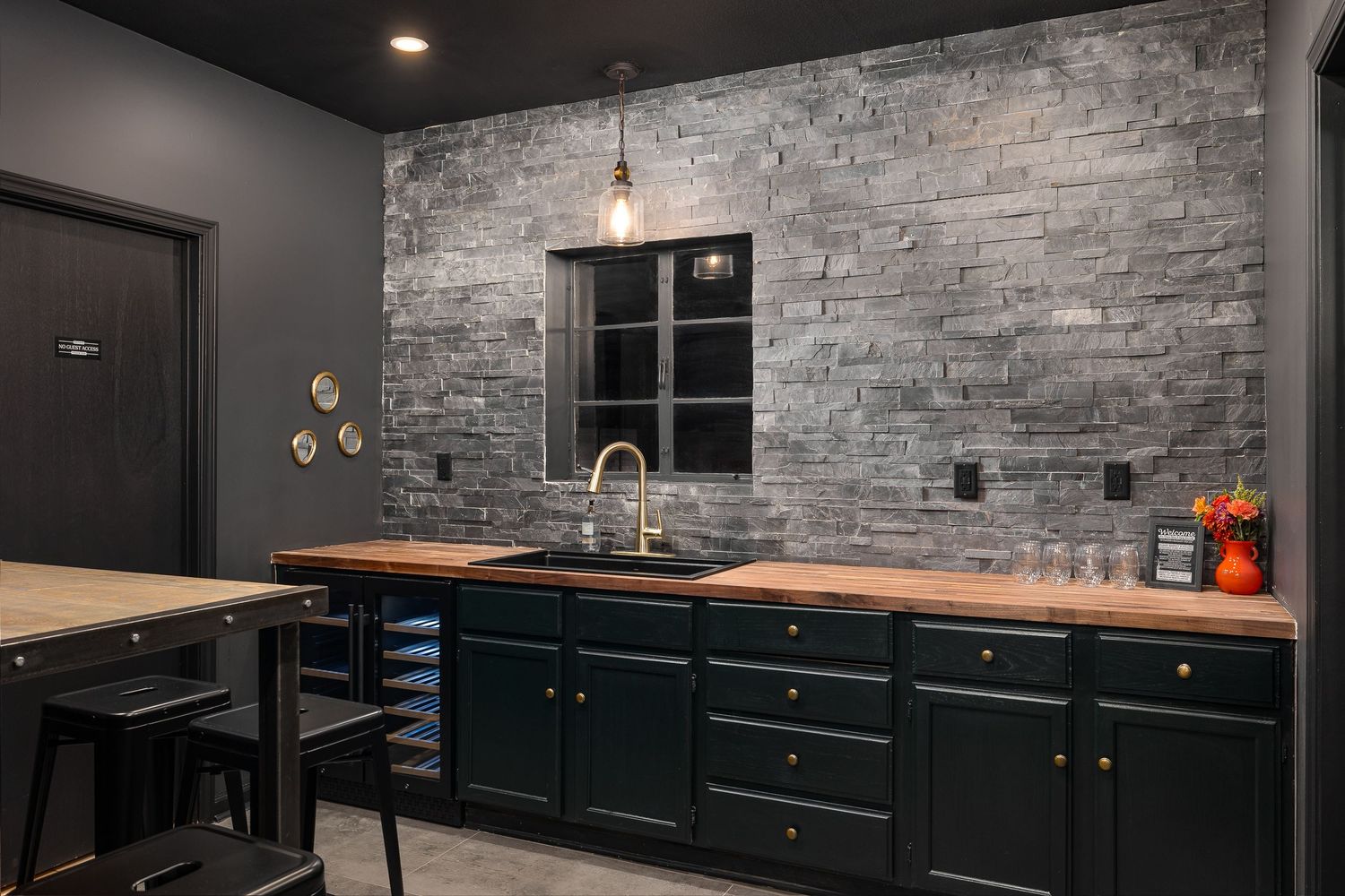 Photo of a hidden bar produced by Derek Mecca in Kansas for a luxury AirBnB short-term rental. Photographer - interiors, luxury real estate