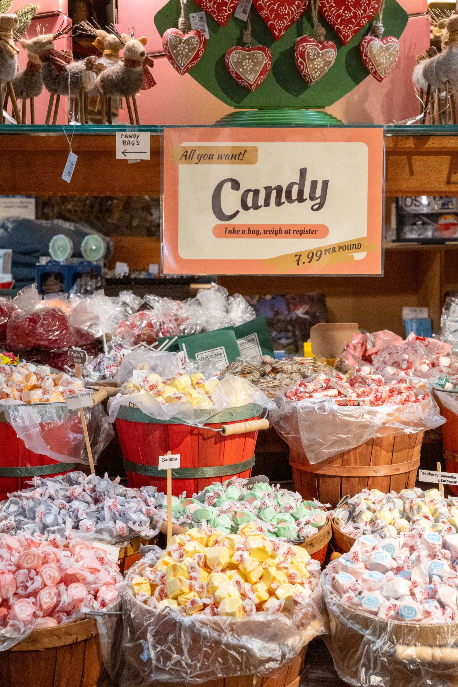 Colorful candies sit in baskets in a store with an old western nostalgic ambiance
