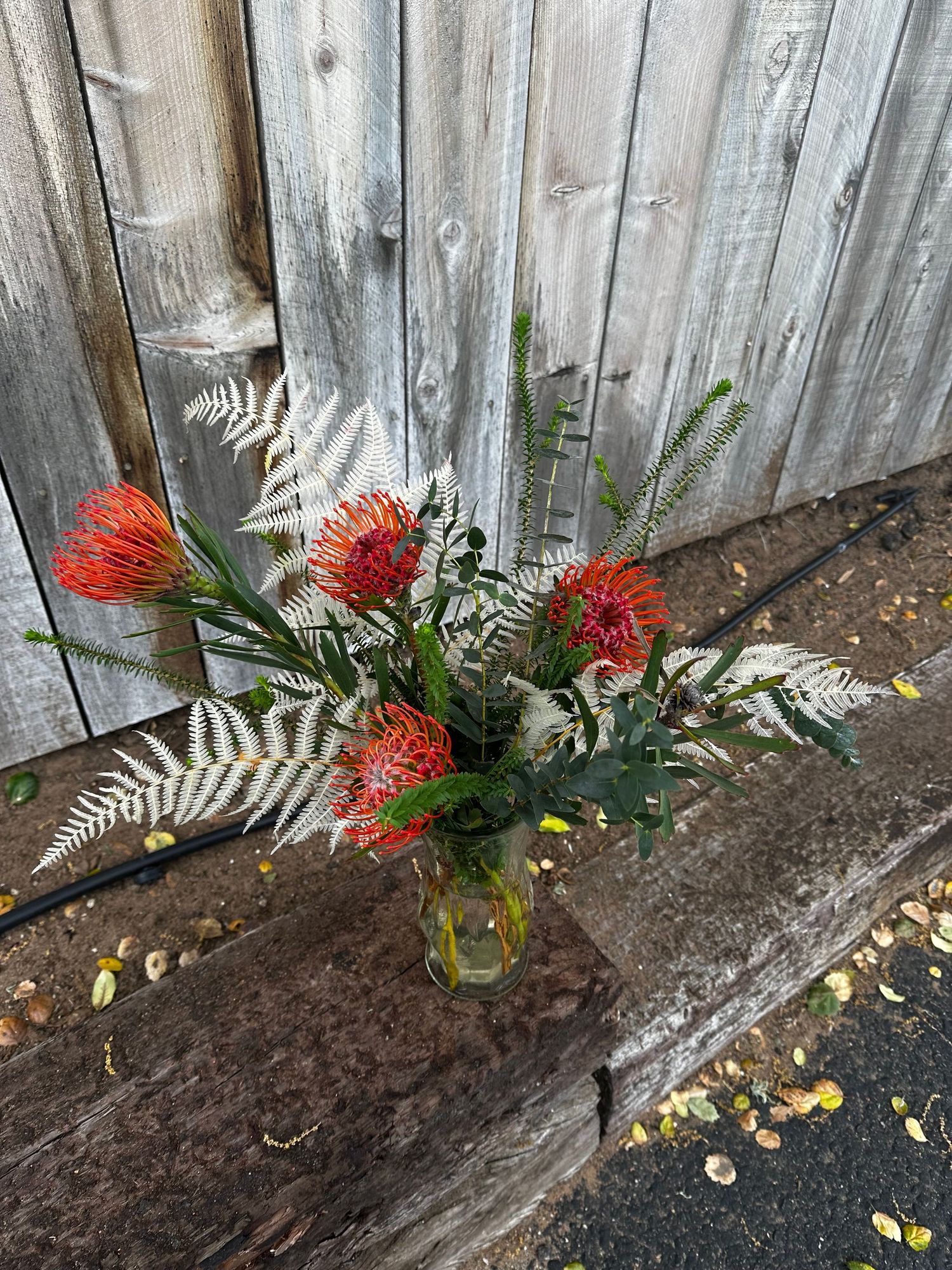 eclectic arrangement of dried ferns and protea displayed in Arroyo Grande