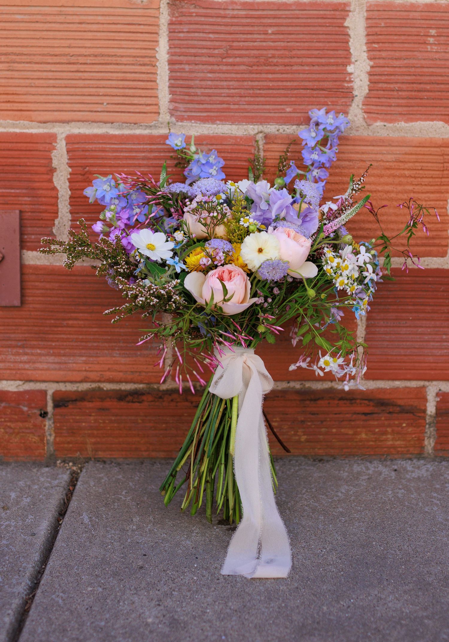 colorful, whimsical, romantic wedding bouquet at a wedding venue in San Luis Obispo California
