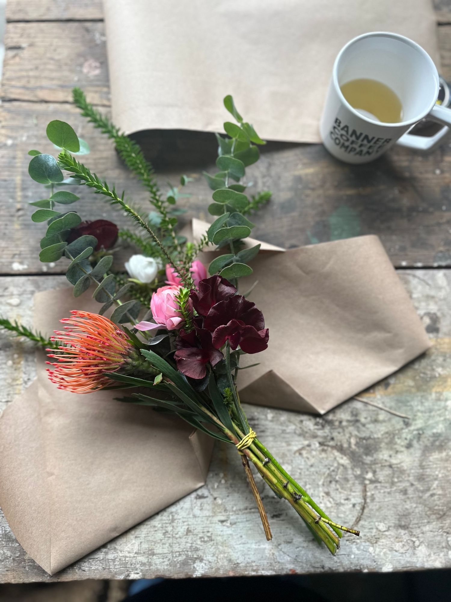 local flower bouquet displayed in process