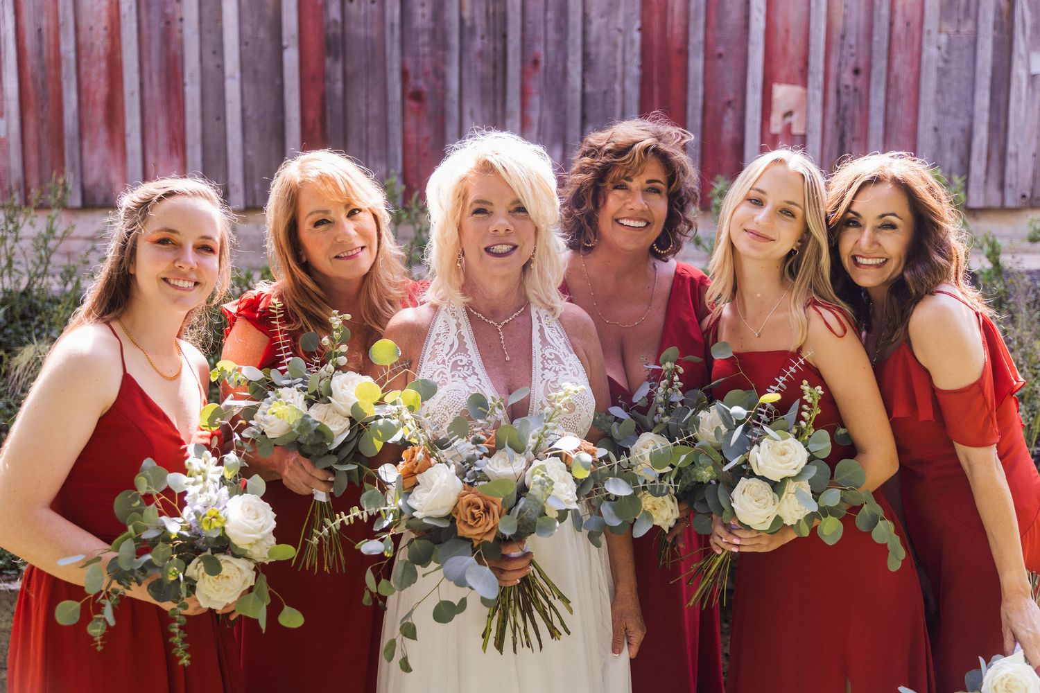 wedding in Avila Beach, San Luis Obispo County, California. Bride and bridesmaids with bouquets, flower arrangements