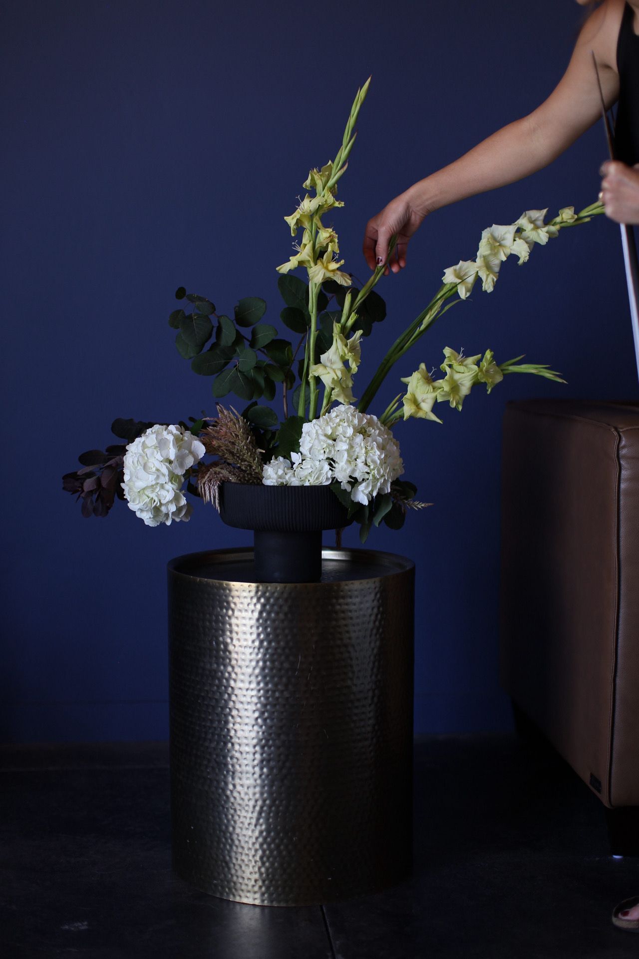 elegant large arrangement displayed in a Paso Robles wine tasting room / winery