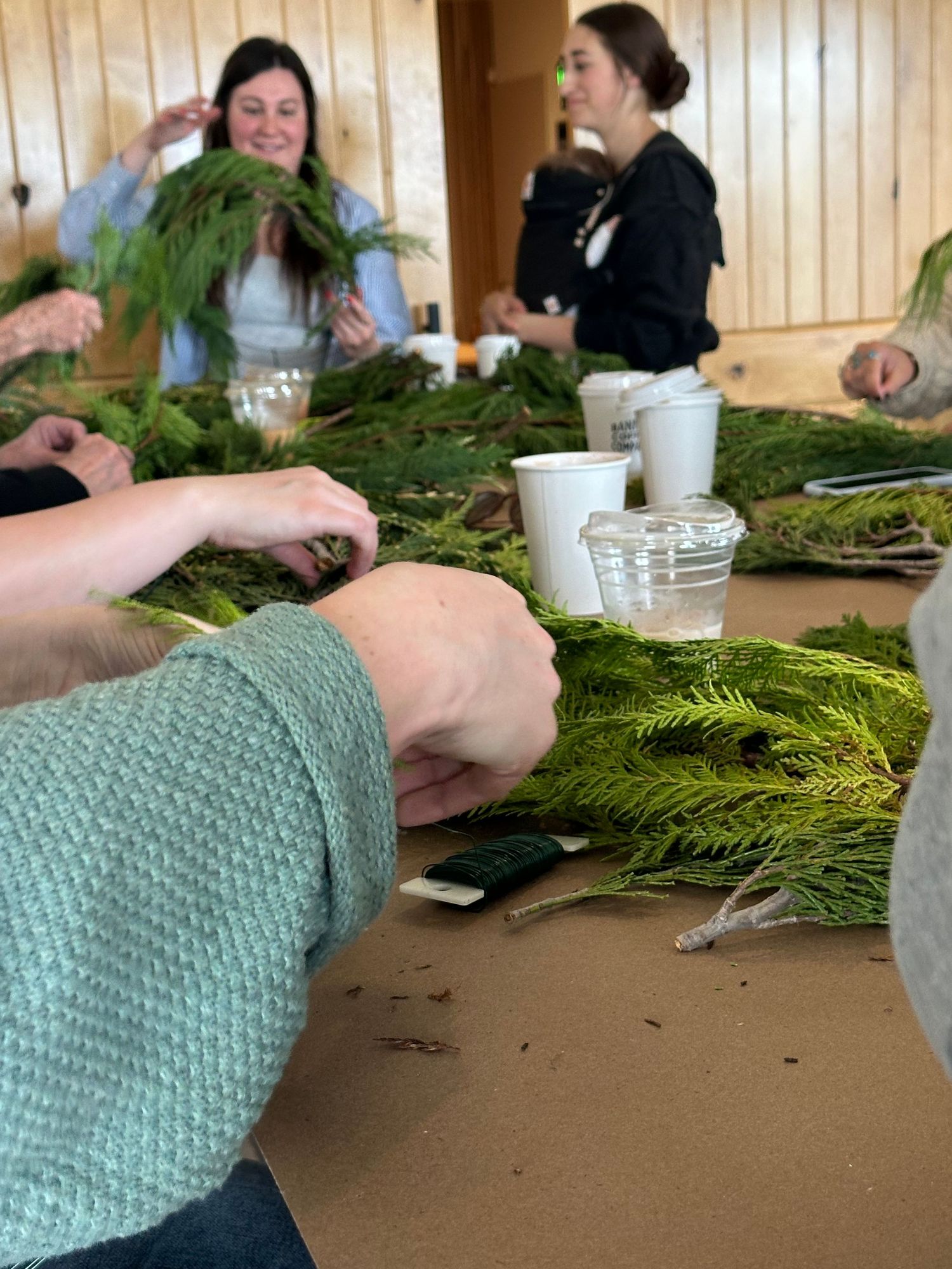 Holiday living greenery for a Christmas wreath floral flower workshop while drinking coffee in Arroyo Grande in San Luis Obispo, California