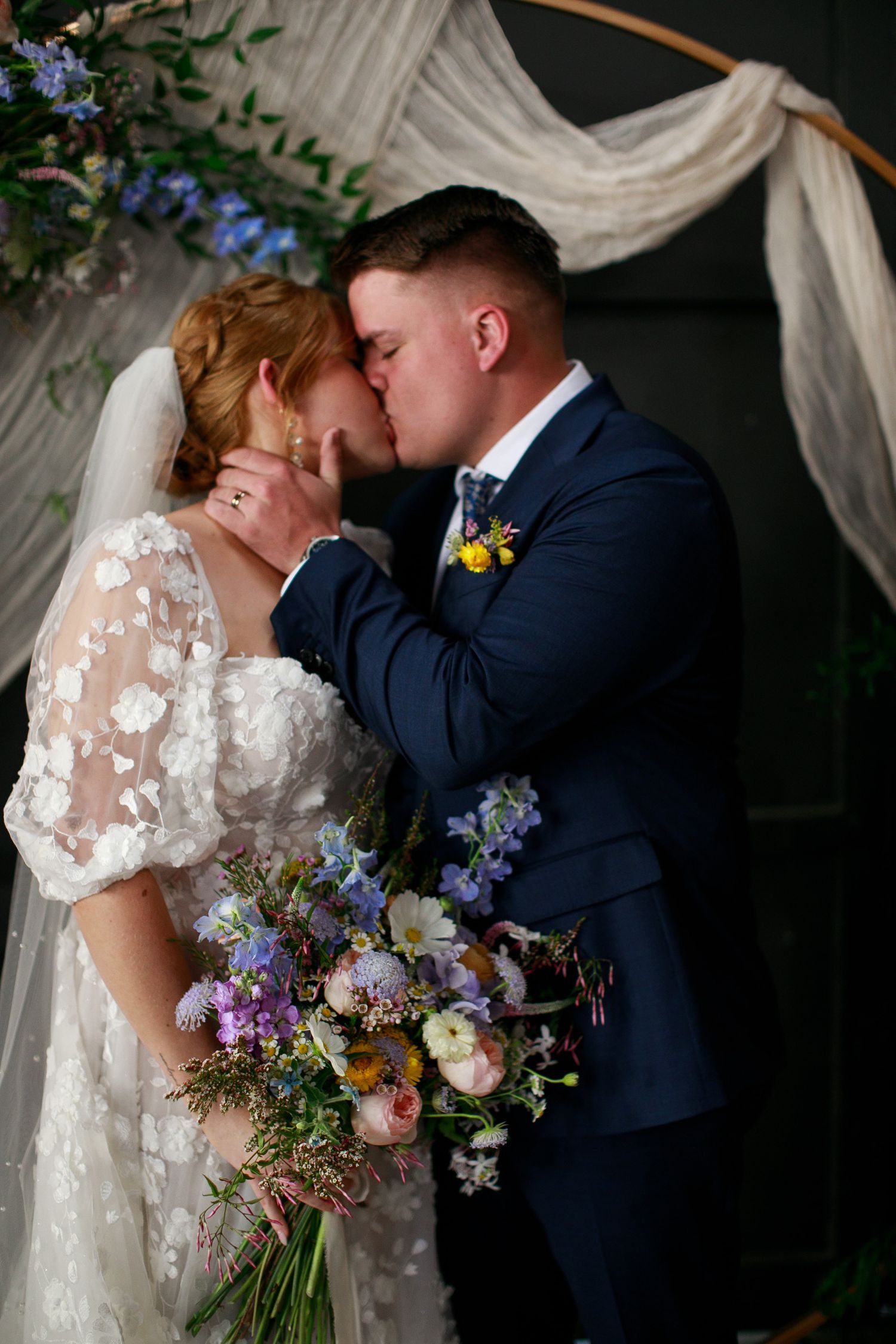 romantic, artful, whimsical, garden-inspired wedding arch at a wedding venue in San Luis Obispo County California