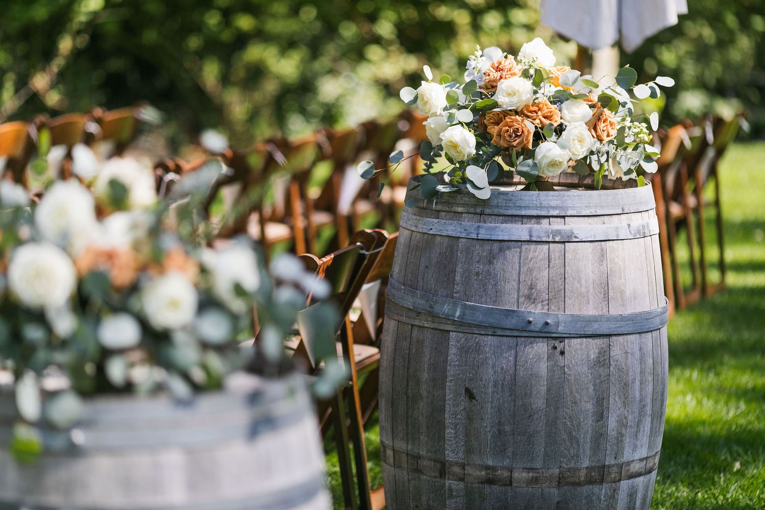 rustic floral arrangements framing a wedding aisle in San Luis Obispo County, California