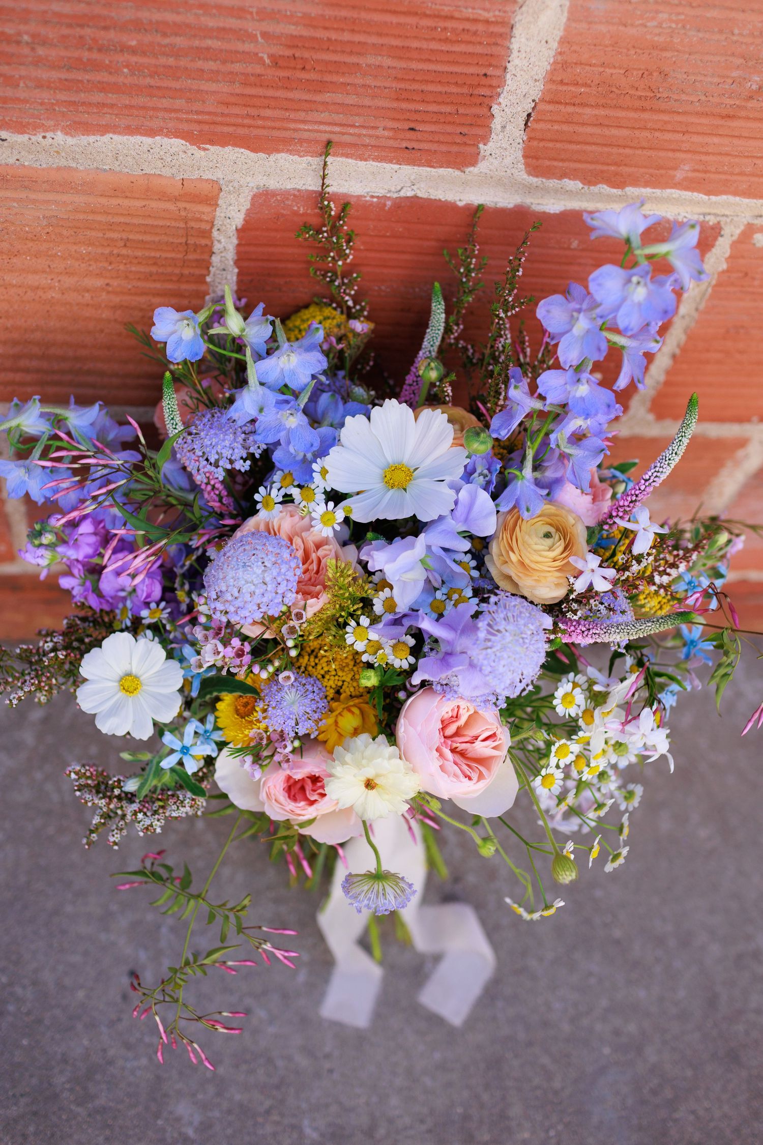 colorful, whimsical, romantic, artful garden-inspired wedding bouquet at a wedding venue in San Luis Obispo, California