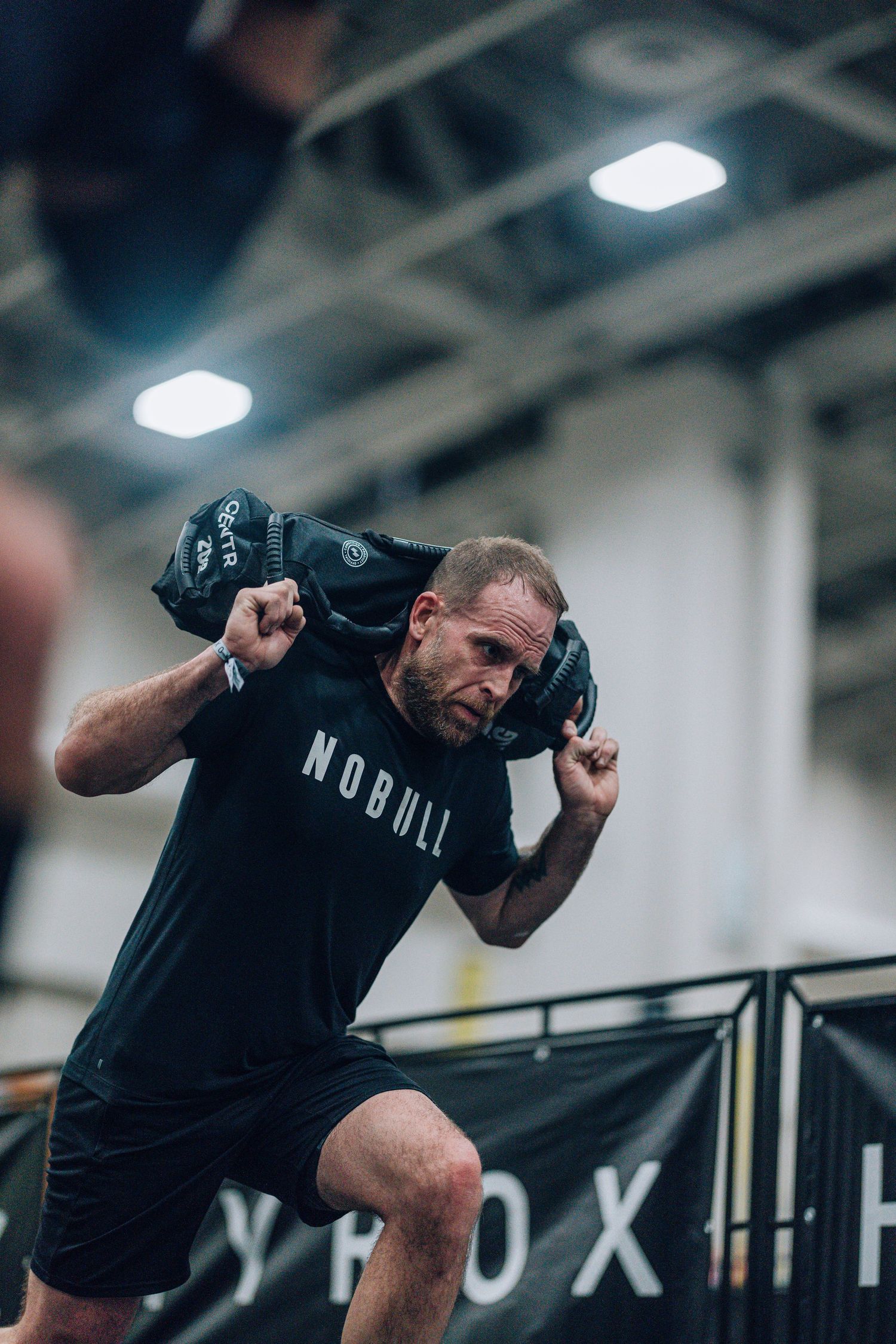 Dynamic shots of intense workout movements in a well-lit indoor gym facility.