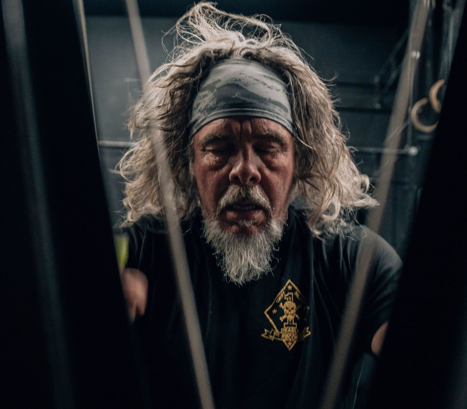 Dramatic moody portraits taken in a dark setting showing determination and focus.