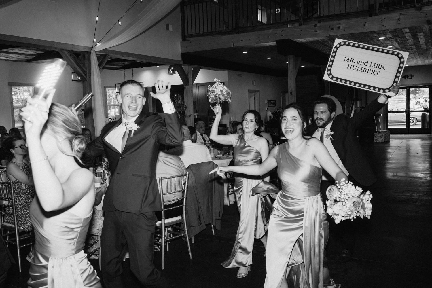 Black and white photos of wedding reception guests dancing and celebrating.