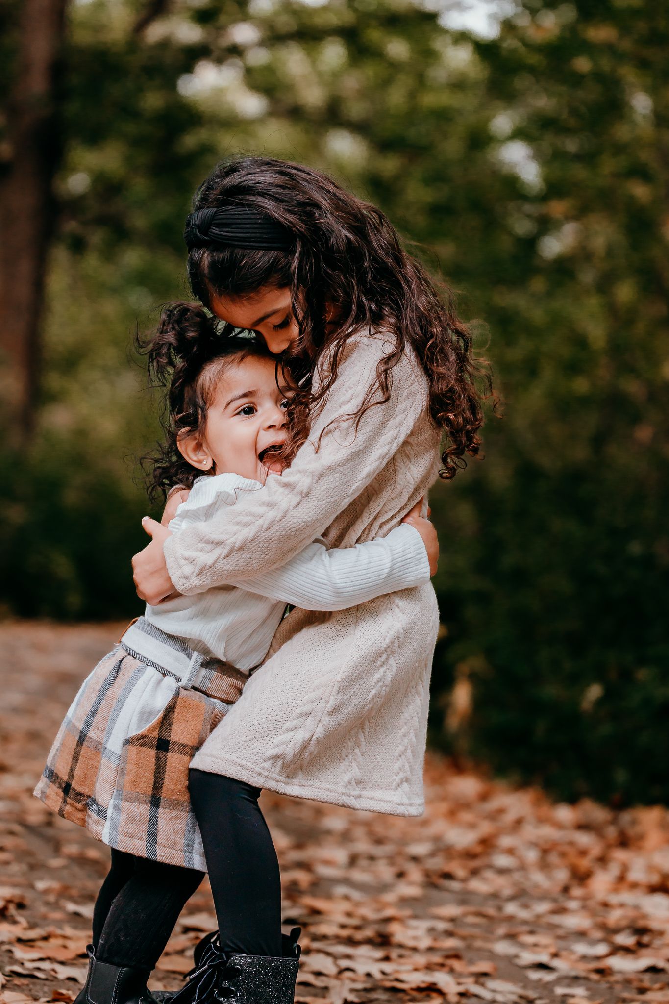 Sibling laughter captured in Chicago fall family portraits