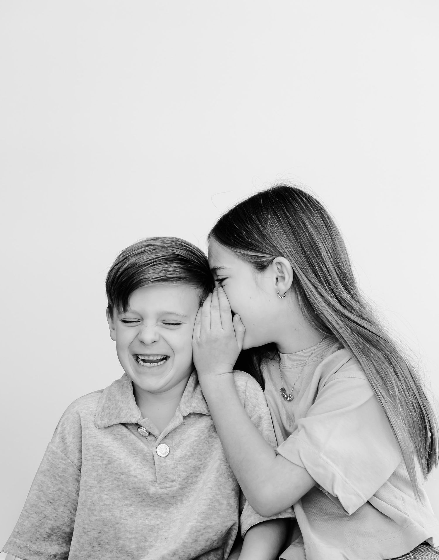 Northbrook studio portrait of siblings telling a joke