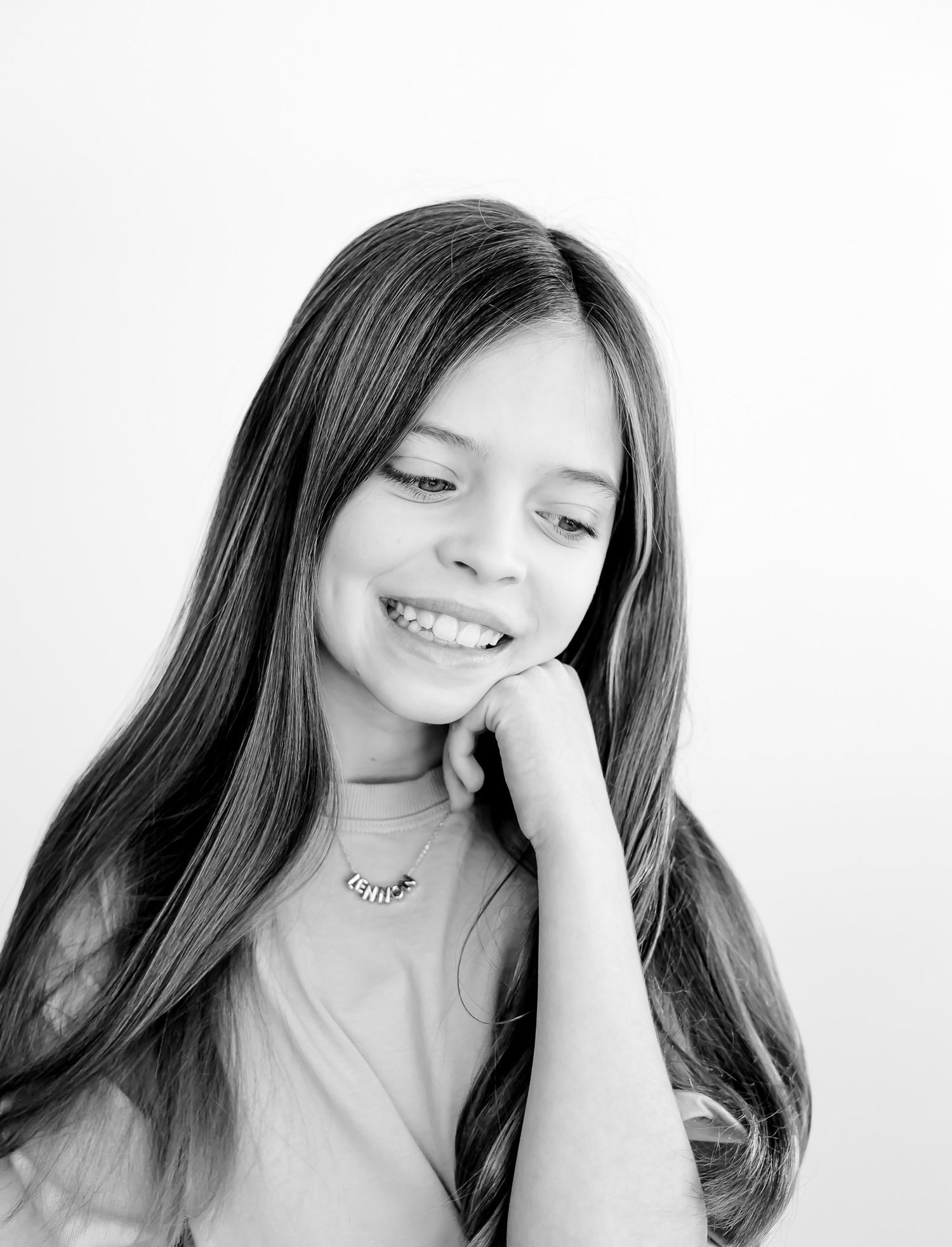 Northbrook studio portrait of girl smiling and looking down