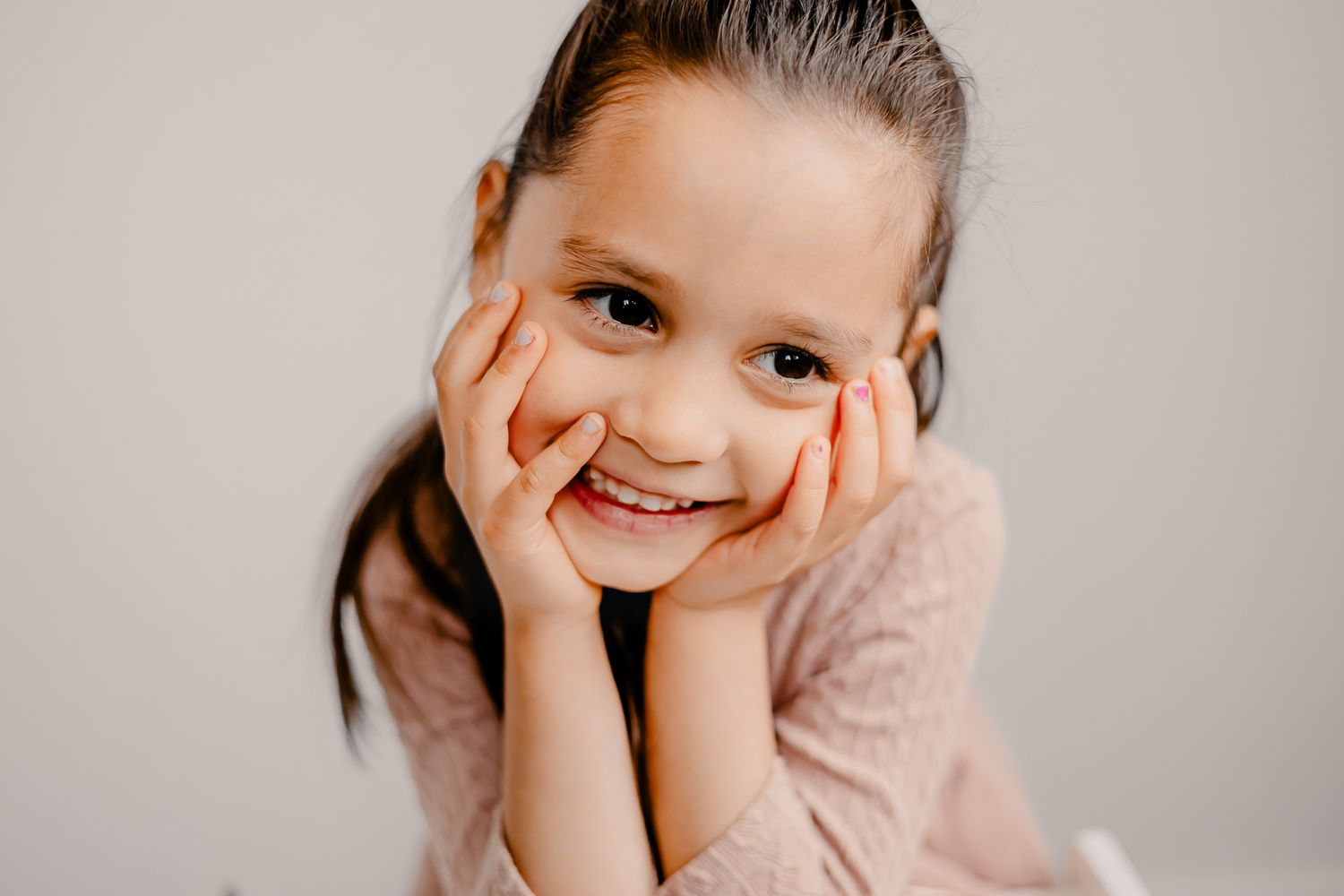 Candid child portrait in Elmhurst photography studio