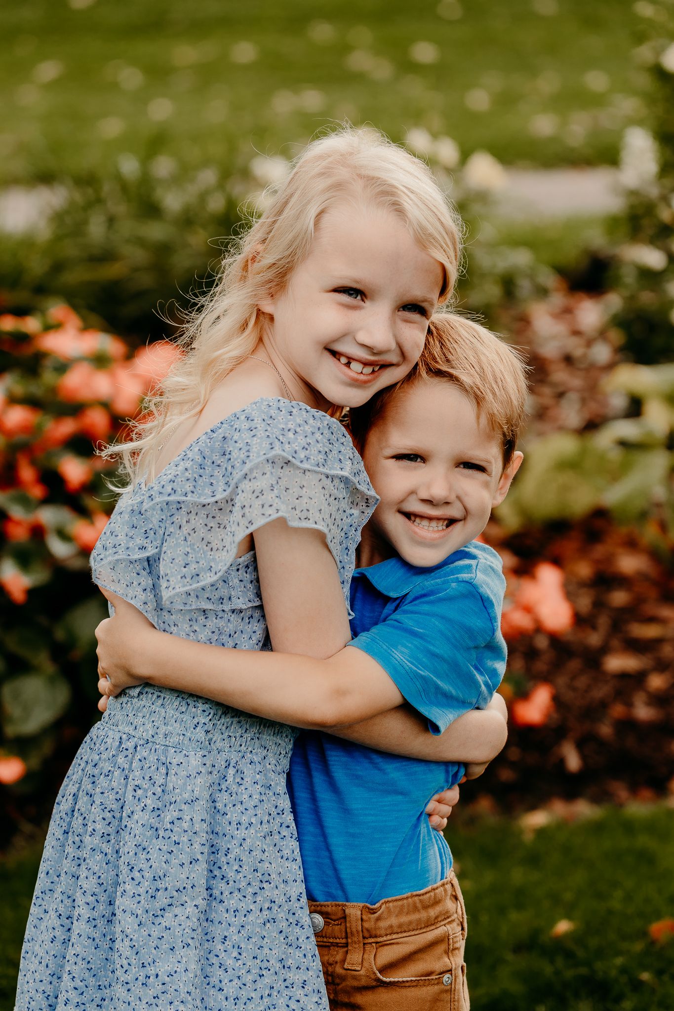 Sibling laughter captured in Itasca family fall mini session