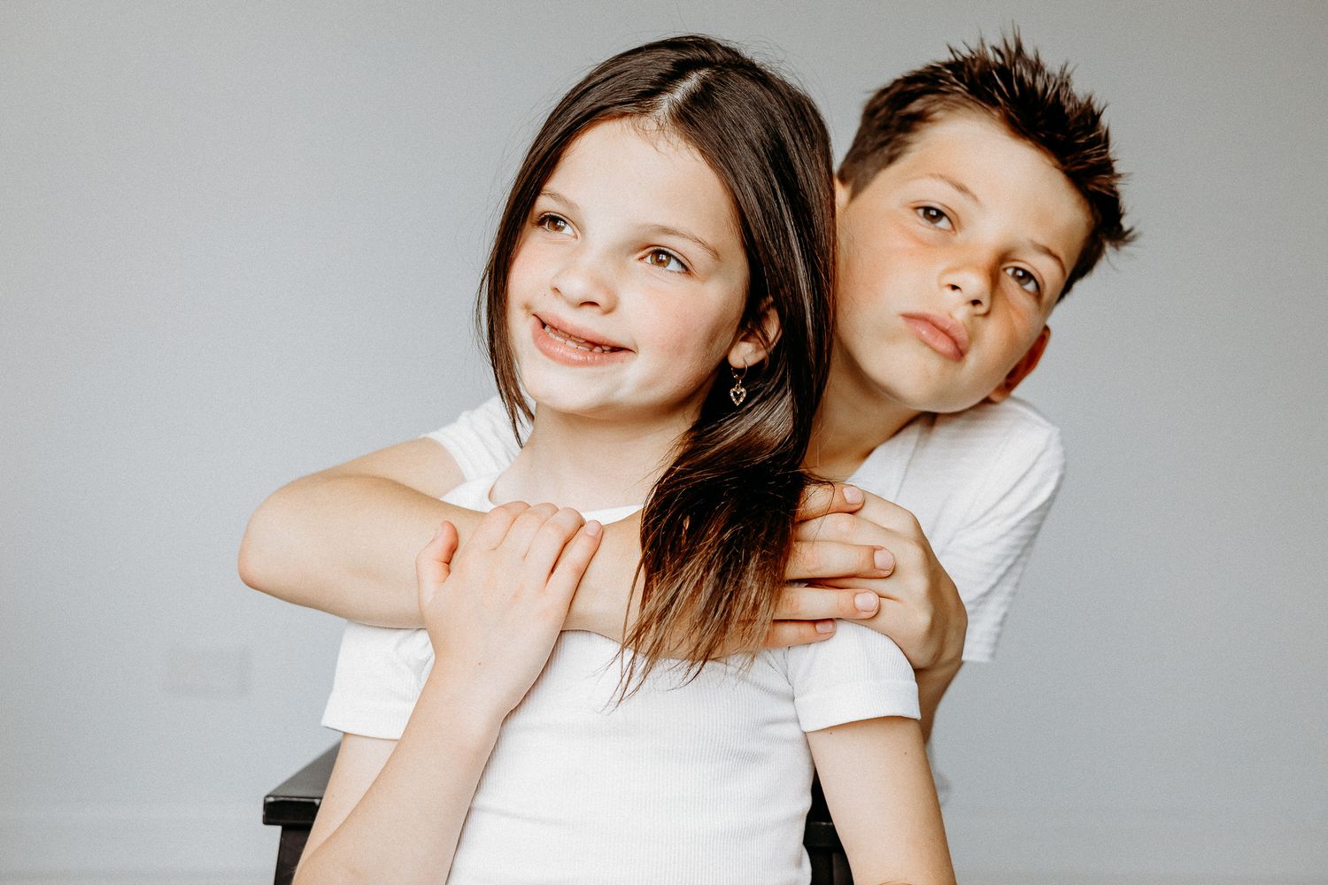 Sibling poses for Studio Photos in Chicago Studio by Chicago Family Photographer