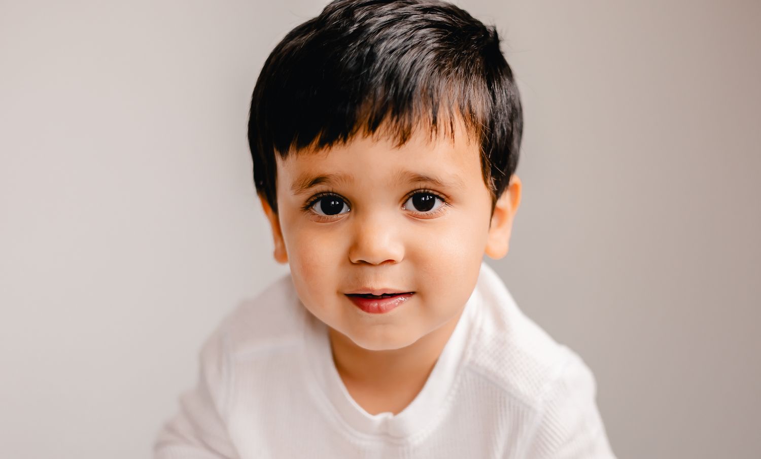 Elmhurst Children's Photographer capturing sweet smiles in studio