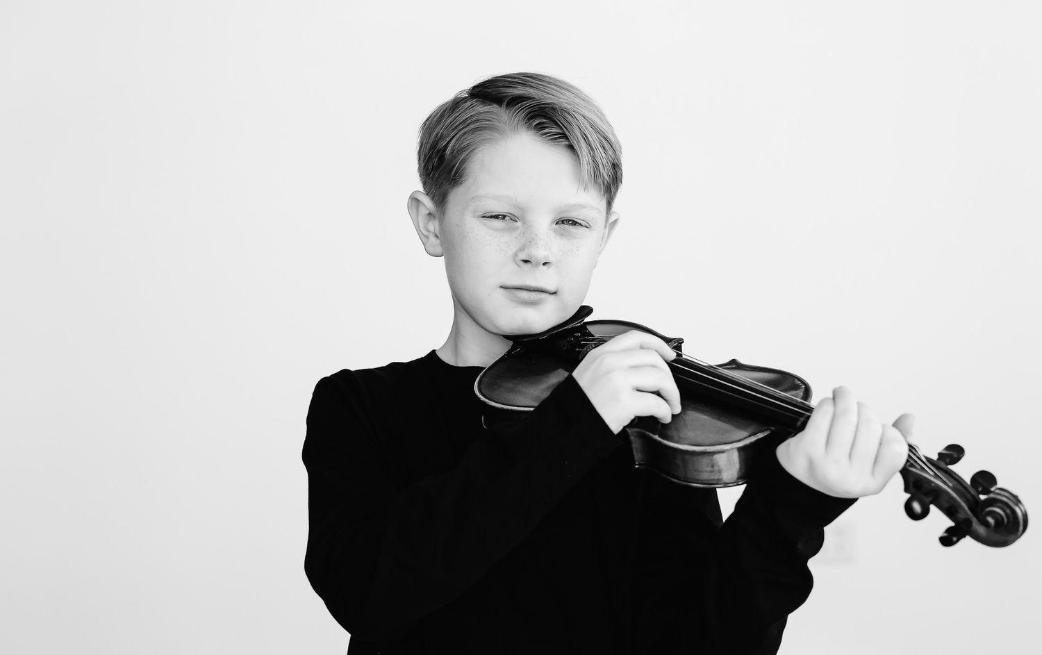 Northbrook kids personality photo with boy playing violin